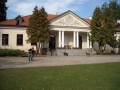 In front of the palace in Dłużew. On right local mongrel who clearly treated Braden as an intruder